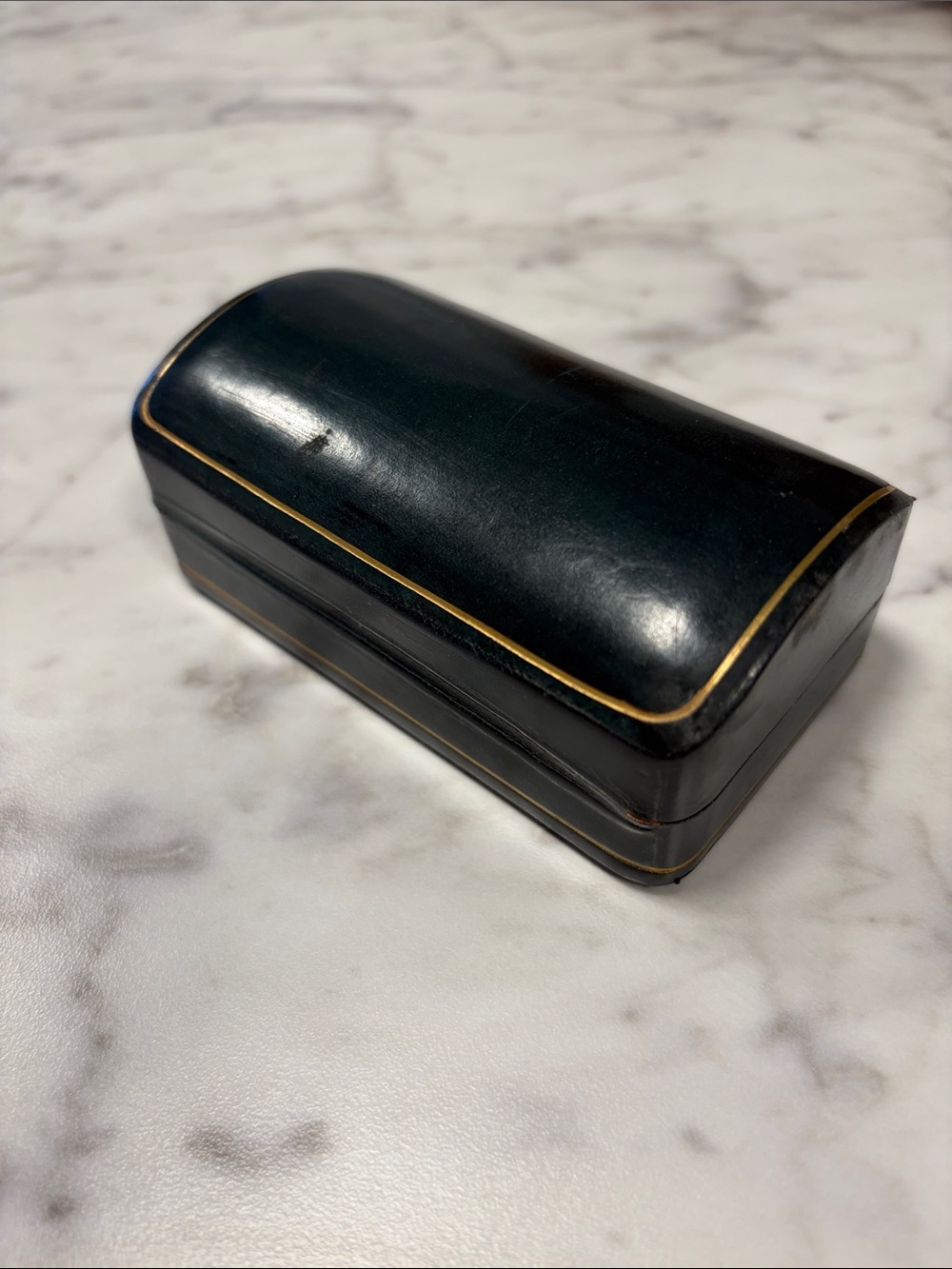 Tooled leather box . Probably made in Italy.
